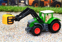 Load image into Gallery viewer, 1539 SIKU 187 SCALE FENDT TRACTOR WITH FRONT LOADER AND ROUND BALE GRAB