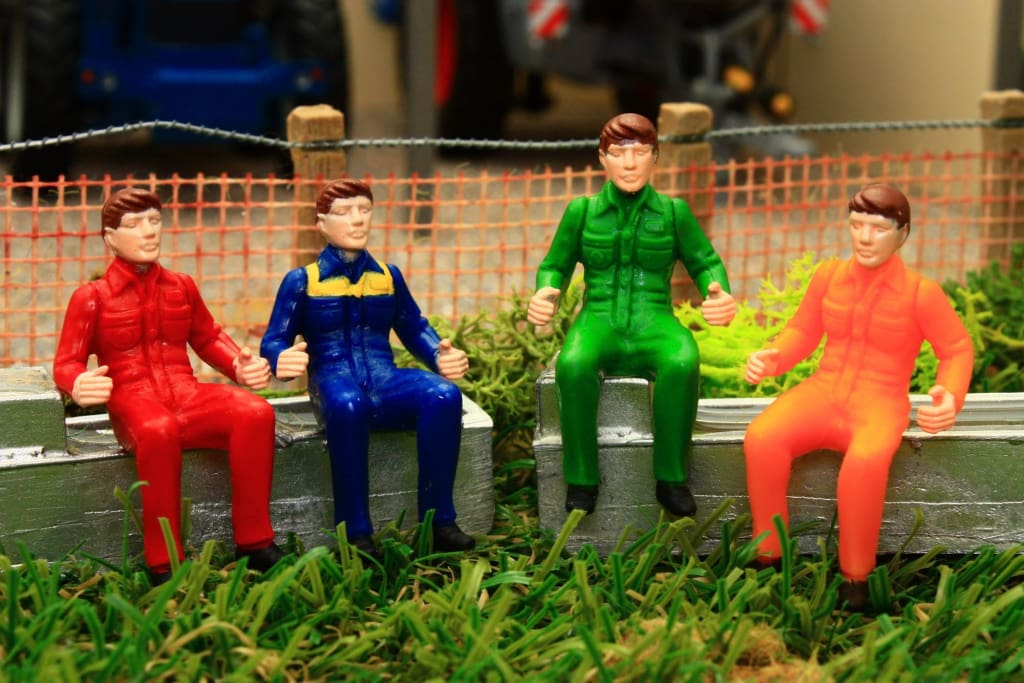 43203 Britains Sitting Tractor Drivers (Set of 4) Brushwood Toys