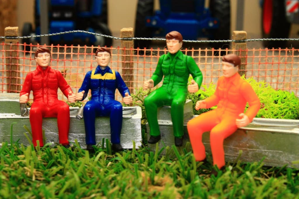 43203 Britains Sitting Tractor Drivers (Set of 4) Brushwood Toys