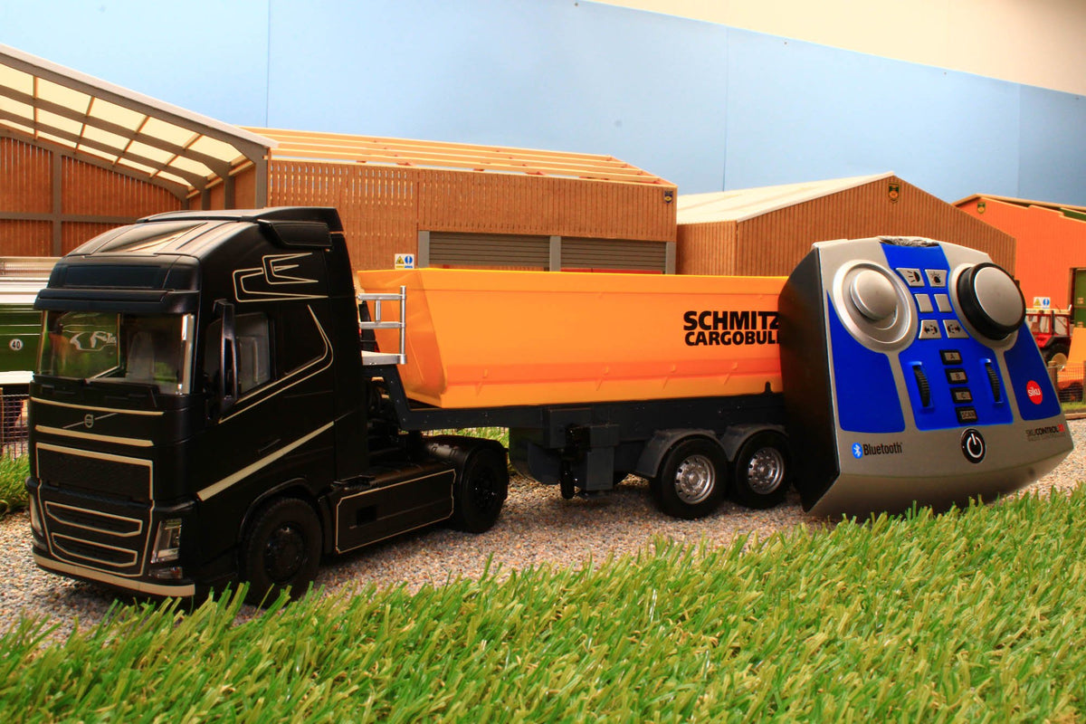 6737 + 6734 SIKU RADIO CONTROLLED VOLVO FH16 LORRY WITH BLUETOOTH HAND  CONTROLLER AND SCHMITZ CARGO BULL 3 AXLE TRAILER