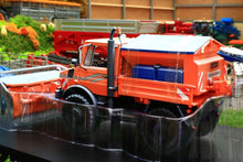 Load image into Gallery viewer, SCH07724 SCHUCO MERCEDES BENZ UNIMOG WITH SNOW PLOUGH AND SALT SPREADER - WINTER WEATHERED
