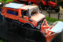 Load image into Gallery viewer, SCH07724 SCHUCO MERCEDES BENZ UNIMOG WITH SNOW PLOUGH AND SALT SPREADER - WINTER WEATHERED