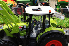 Load image into Gallery viewer, W7325 WIKING CLAAS ARION 650 TRACTOR WITH FRONT LOADER AND BUCKET