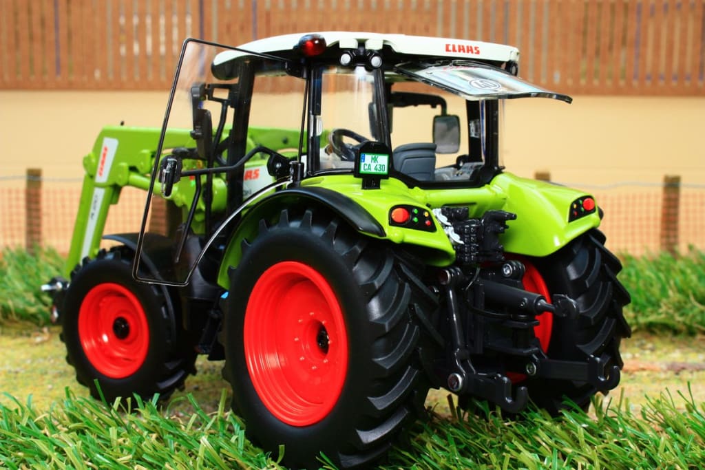 WIKING tracteur miniature Claas Arion 430à chargeuse sur roues zinc 1:32  vert - Cdiscount Jeux - Jouets