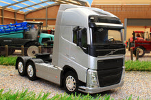 Load image into Gallery viewer, WEL32690LS WELLY 132 SCALE VOLVO FH 6X2 LORRY IN SILVER