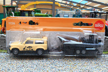 Load image into Gallery viewer, 1126 Siku Small Scale Land Rover Defender Safari with Boat