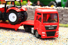 Load image into Gallery viewer, 1764 Siku Small Scale MAN low loader lorry with Steyr tractor