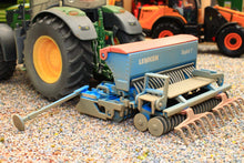 Load image into Gallery viewer, Siku Lemken Saphir 7 weathered seed drill model in blue and beige attached to a green tractor on a miniature farm display