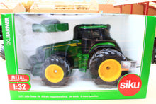 Load image into Gallery viewer, Boxed Siku 1 32 scale John Deere 8R 410 tractor model with dual front and rear wheels in green packaging
