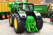Load image into Gallery viewer, Siku John Deere 6M 220 model tractor in green and yellow with detachable 683R front loader shown on a farm diorama in 1 32 scale