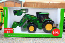 Load image into Gallery viewer, Boxed Siku John Deere 6M 220 tractor model in 1:32 scale with detachable front loader, green and yellow detailing, and spare hood accessory visible.