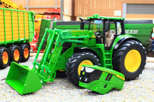 Load image into Gallery viewer, Siku 1:32 scale John Deere tractor model with detachable 683R front loader and green bucket displayed on a farm diorama with detached bonnet