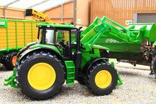 Load image into Gallery viewer, Siku John Deere 6M 220 tractor model with green front loader and yellow wheels displayed in a farm diorama, 1:32 scale farm toy