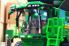 Load image into Gallery viewer, Britains John Deere S7 900 tracked combine harvester model in green with detailed cab controls glass windows and access ladder close up view