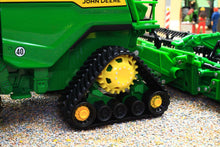 Load image into Gallery viewer, Britains John Deere S7 900 tracked combine harvester model in green with detailed rubber tracks and yellow wheels shown in a farm diorama