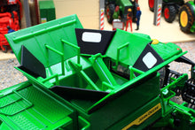 Load image into Gallery viewer, Britains John Deere S7 900 tracked combine harvester model in green with detailed grain tank and machinery components on display