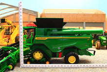 Load image into Gallery viewer, Product measurement image showing a Britains John Deere S7 900 combine harvester model with vertical and horizontal rulers for size reference
