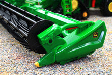 Load image into Gallery viewer, Britains 1:32 scale John Deere combine harvester header in green with detailed cutting reels and yellow branding shown on a miniature farm scene surface
