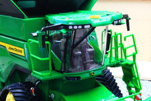 Load image into Gallery viewer, Close up of a Britains John Deere S7 900 tracked combine harvester model showing the green cab glass steps and rubber tracks