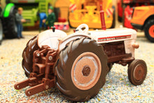 Load image into Gallery viewer, Weathered Britains David Brown 990 2WD Selectamatic tractor model in brown finish displayed on gravel with farm vehicles in the background
