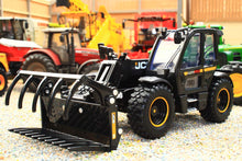 Load image into Gallery viewer, Britains 1:32 scale black JCB 542 70 AgriPro Loadall model with front bucket displayed on a farm diorama among agricultural machinery