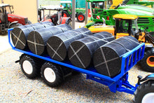 Load image into Gallery viewer, 8615 Siku 1:32 Scale New Holland T7.315 HD Tractor with Round Bale Trailer