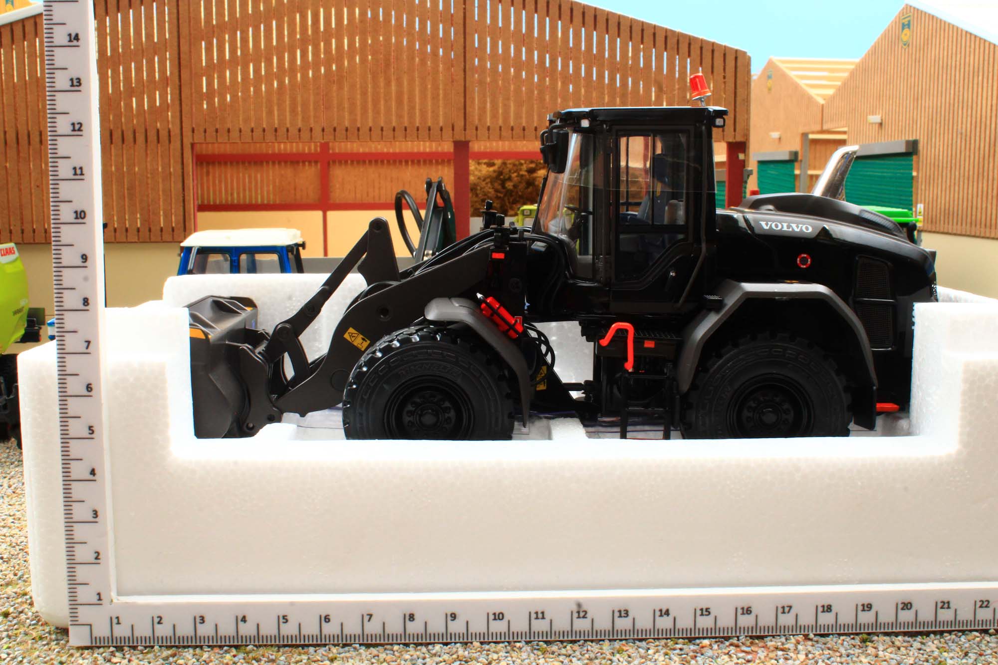 Chargeur sur pneus VOLVO L60H avec une échelle de 1/32 conçu par AT COLLECTION sur Chargeur sur pneus VOLVO L60H avec une échelle de 1/32 conçu par AT COLLECTION sur