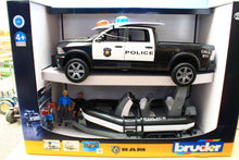 Load image into Gallery viewer, B02507 Bruder RAM 2500 Police Pick-up and Boat with Policeman and Diver BOX NOT 100%