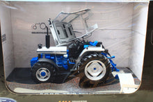 Load image into Gallery viewer, BROKEN UH2882 Universal Hobbies Ford 7810 1987 Jubilee Edition 4WD Tractor BROKEN - SNAPPED CAB AND PARTS AS SHOWN