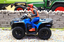 Load image into Gallery viewer, Diecast Masters 1:32 scale blue quad bike with a helmeted rider on gravel in a detailed farm diorama
