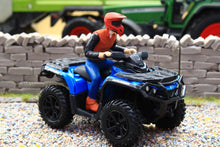 Load image into Gallery viewer, Diecast Masters 1 to 32 scale Outlander XT 1000R quad bike with rider displayed on gravel beside a stone wall in a farm diorama