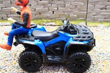Load image into Gallery viewer, Blue Diecast Masters 1 32 scale quad bike model with a helmeted rider on a gravel diorama beside a stone wall