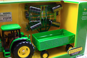 ERT15489 Ertl 1:32 Scale John Deere 6410 4WD Tractor with trailer and disk harrows