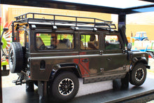Load image into Gallery viewer, GT Spirit Models 1:18 scale Land Rover Defender 110 in dark grey with roof rack spare wheel and off road details shown as a collectible model vehicle