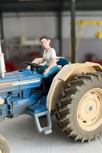 HLT-WM093B HLT Lady Tractor Driver with Blue Jeans