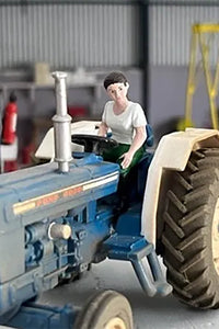 HLT-WM093G HLT Lady Tractor Driver with Green Jeans