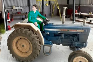 HLT-WM024 Tractor Driver Looking Over His Shoulder IN GREEN