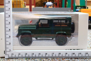 NOV845108 Norev 1:43 Scale Land Rover Defender 90  1995 in dark Green