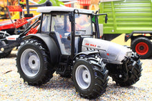 Load image into Gallery viewer, ROS 1:32 scale Hurliman XB Max 100 4WD tractor model with a silver body black tyres and detailed cab on a farm machinery display