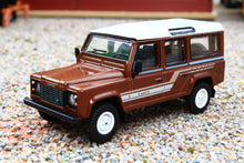 Load image into Gallery viewer, TSMMGT00734R Mini GT 1:64 Scale Land Rover Defender 110 1985 County Station Wagon in Russet Brown RHD