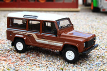 Load image into Gallery viewer, TSMMGT00734R Mini GT 1:64 Scale Land Rover Defender 110 1985 County Station Wagon in Russet Brown RHD