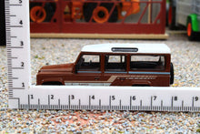 Load image into Gallery viewer, TSMMGT00734R Mini GT 1:64 Scale Land Rover Defender 110 1985 County Station Wagon in Russet Brown RHD