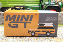 Load image into Gallery viewer, TSMMGT01311 MINI GT 1:64 Scale Range Rover 1981 Camel Trophy Sumatra (N. Sudmann &amp; F. Hofmann)