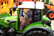 Load image into Gallery viewer, Universal Hobbies Fendt 516 Vario 4WD tractor model in green with front loader and detailed cab shown in a farm display