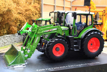 Load image into Gallery viewer, Universal Hobbies Fendt 516 Vario 4WD tractor model in green with front loader and bucket displayed on a farm diorama base