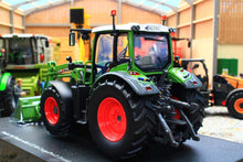 Load image into Gallery viewer, Universal Hobbies Fendt 516 Vario 4WD tractor model with front loader in a farm workshop diorama at 1:32 scale