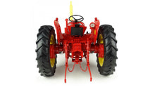 Load image into Gallery viewer, Rear view of a red and yellow 1:16 scale David Brown 950 tractor model by Universal Hobbies with large black tyres and detailed rear linkage