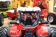 Load image into Gallery viewer, Red Universal Hobbies Massey Ferguson 9S.425 4WD tractor model with dual wheels and enclosed cab, a 1:32 scale agricultural model.