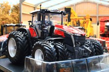 Load image into Gallery viewer, Universal Hobbies Massey Ferguson 9S 425 4WD tractor model in red with dual wheels displayed in a workshop setting as a collectible 1 32 scale farm model