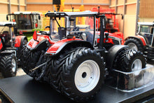 Load image into Gallery viewer, Universal Hobbies Massey Ferguson 9S.425 4WD tractor model with dual wheels displayed among other red agricultural models at 1:32 scale